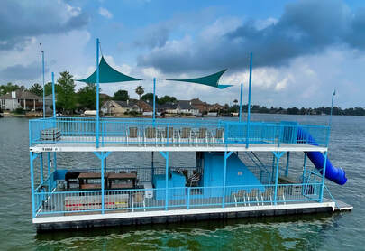 Blue Party Barge from Nauti-Dayz Boat Rentals on Lake Conroe, perfect for birthdays, celebrations, and group lake parties in Montgomery, Texas